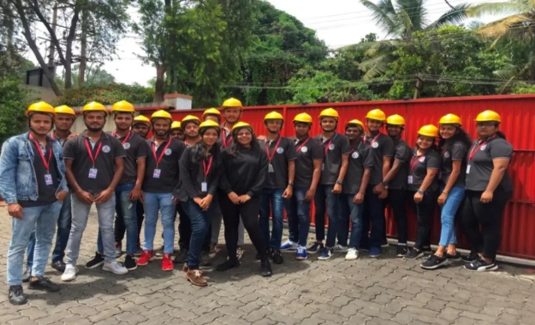 Students in safety helmets at GRS Engineering