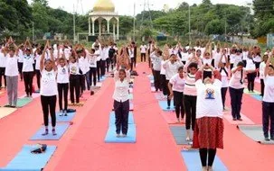 Students practising yoga on International Yoga Day